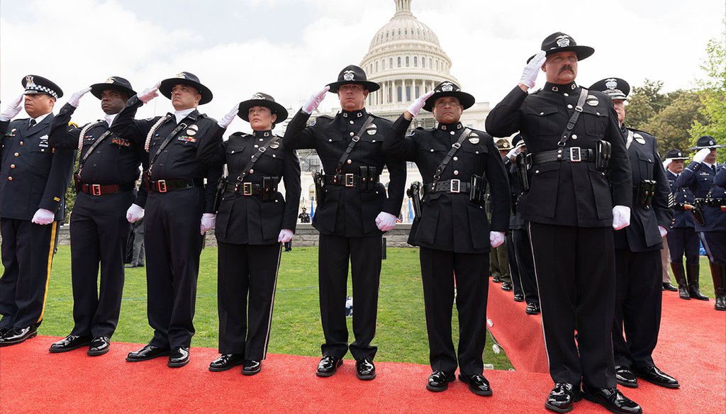 Police honor guards salute May 15, 2022, during the National Peace Officers' Memorial Service on in Washington. The service honored the law enforcement officers who died in the line of fire. (AP)