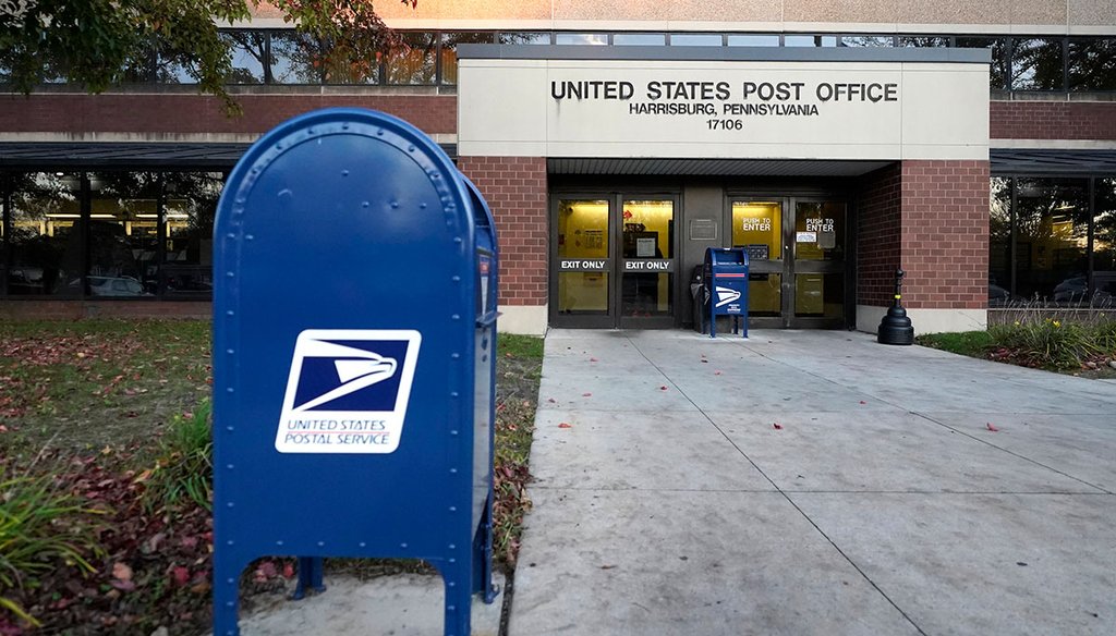 A mailbox sits outside a U.S. Post Office building, Tuesday, Nov. 3, 2020, in the Susquehanna Township section of Harrisburg, Pa. (AP)
