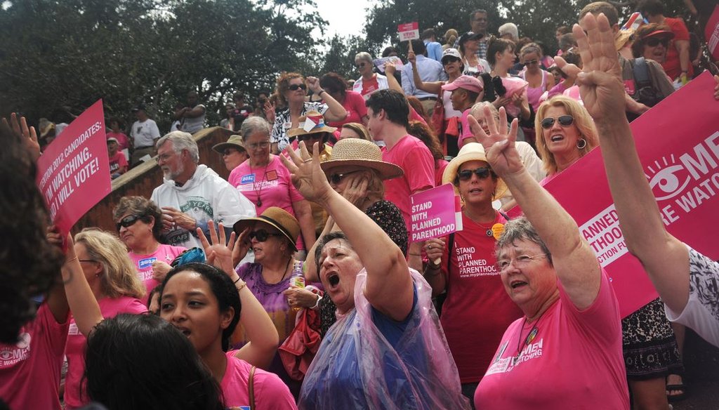 Planned Parenthood supporters chant "four more years!" during a rally during the second day of the Republican National Convention August 29, 2012 in Tampa, FL. (Leah Millis | Tampa Bay Times)