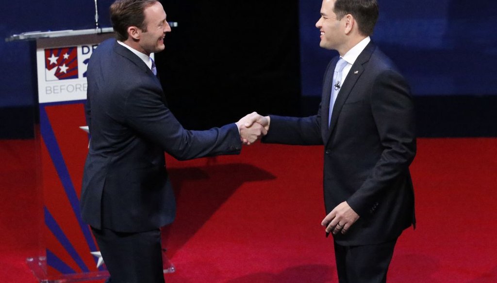 Rep. Patrick Murphy, left, and Sen. Marco Rubio shake hands before the start of a debate, Wednesday, Oct. 26, 2016, at Broward College in Davie, Fla. Rubio and Murphy held their second and final debate, 13 days before the election. 