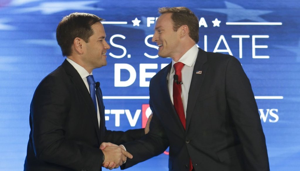 Sen. Marco Rubio, R-Fla., left, and Rep. Patrick Murphy, D-Fla., shake hands before their debate at the University of Central Florida, Monday, Oct. 17, 2016, in Orlando, Fla. (AP photo)