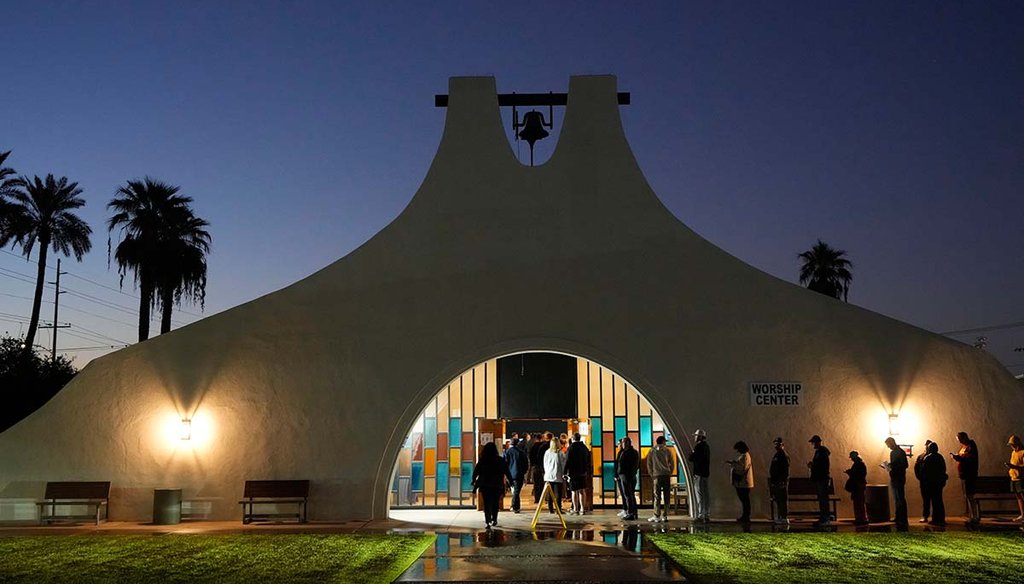 Voters stand in line outside Madison Church, a polling place, on Election Day, Nov. 5, 2024, in Phoenix. (AP)