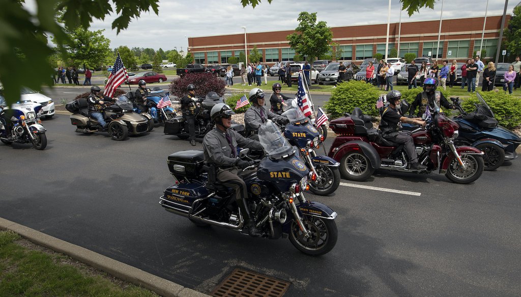 New York State Troopers lead a procession after the funeral service for Aaron Salter Jr. at The Chapel at Crosspoint on May 25, 2022, in Getzville, N.Y. Salter Jr. was killed in the Buffalo supermarket shooting on May 14. (AP)