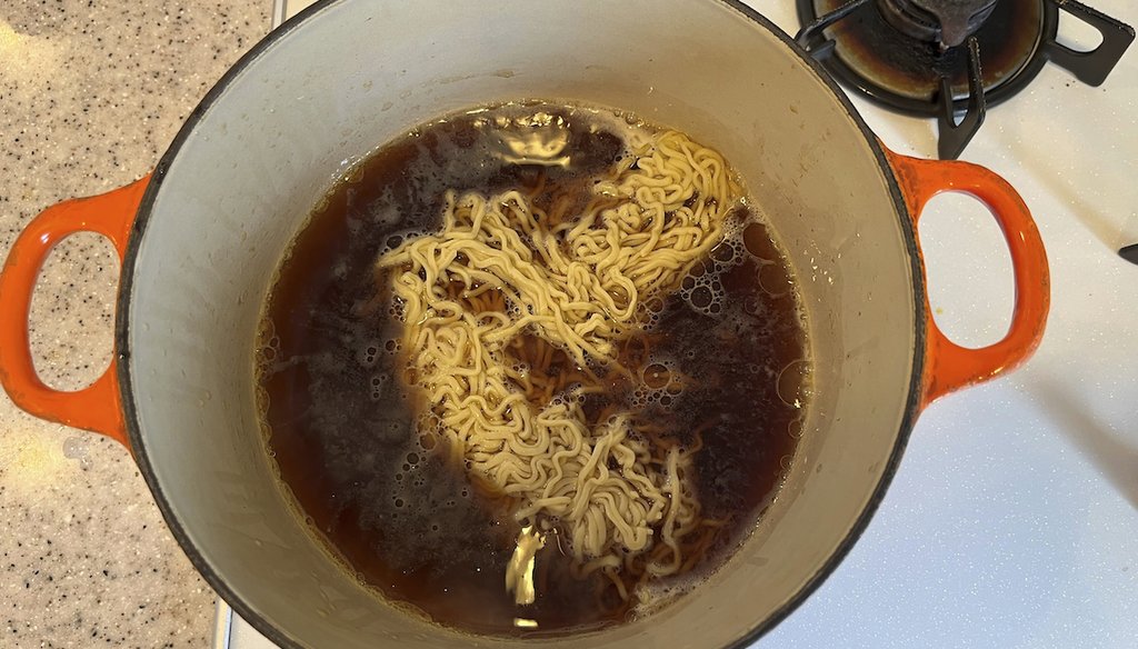 This file photo shows Ramen noodles added to a pot of soup. (AP)