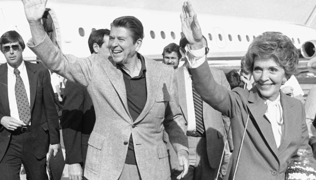 Then-President elect Ronald Reagan and wife Nancy wave to a crowd of onlookers upon their arrival at the Palm Springs, Calif., airport in November 1980. Reagan signed the first no-fault divorce law in 1969 when he was California's governor. (AP)