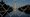 The Washington Monument, reflected in the Lincoln Memorial Reflecting Pool, is seen behind fencing, Thursday, June 25, 2026, in Washington. (AP Photo/Carolyn Kaster)