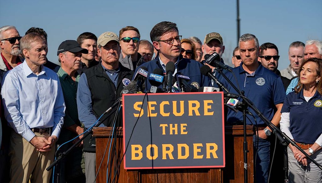 U.S. House Speaker Mike Johnson speaks Jan. 3, 2024, as he stands with Republican members of Congress in Eagle Pass, Texas. House Homeland Security Chair Mark Green, R-Tenn., is in the front row, second from left. (AP)