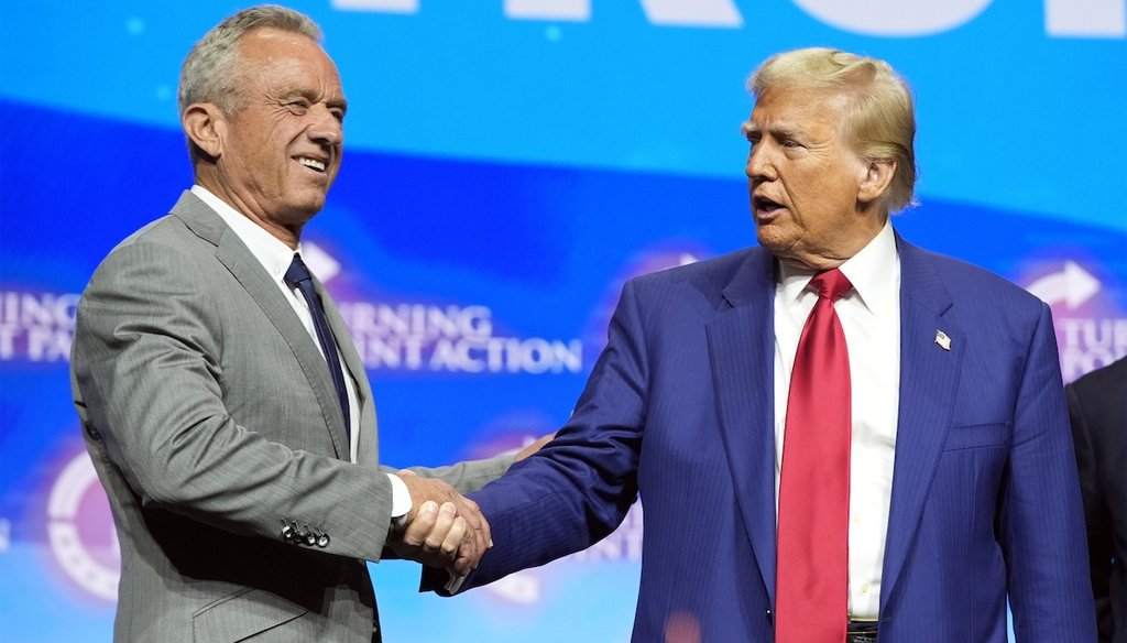 President-elect Donald Trump and Robert F. Kennedy Jr. shake hands Oct. 23, 2024, at a Turning Point Action campaign rally in Duluth, Ga. (AP)