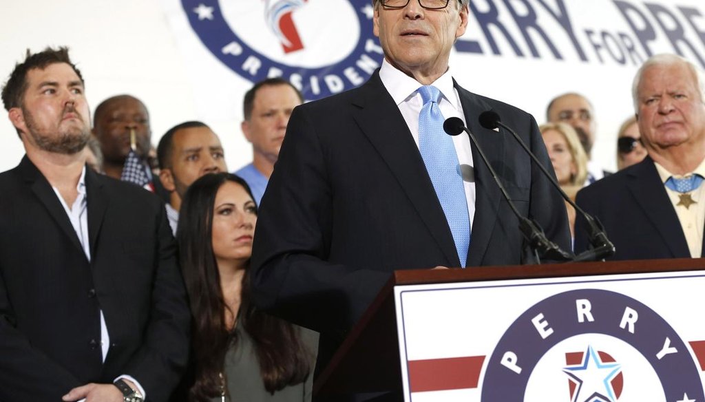 Former Texas Gov. Rick Perry announces his 2016 White House run surrounded by supporters on June 4, 2015, in Dallas. Getty.