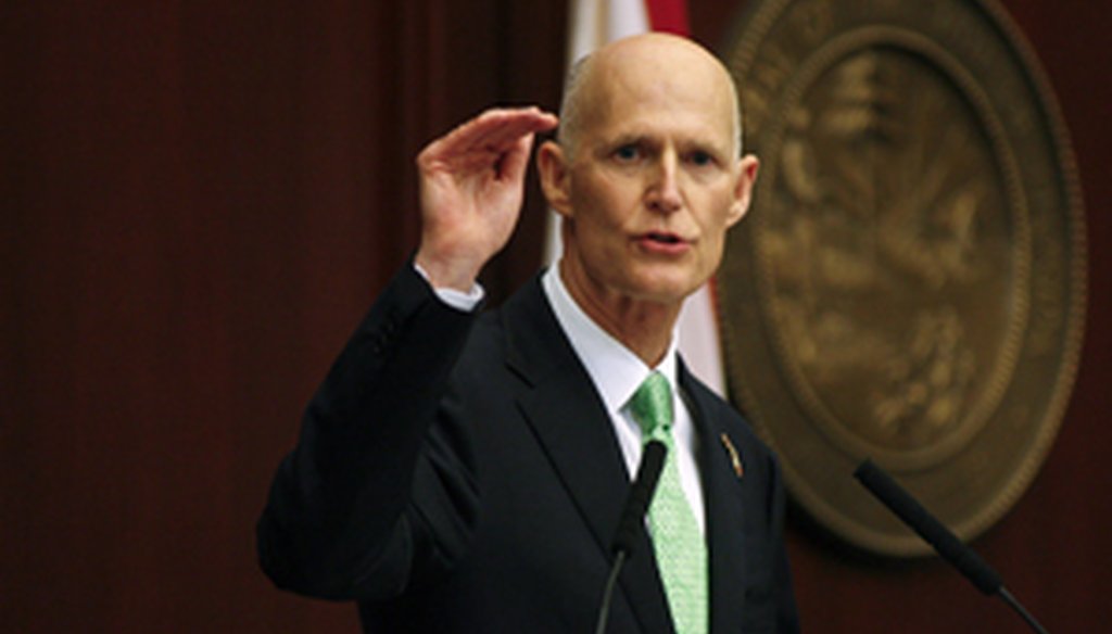 Rick Scott talked about job creation, education and tax cuts during his fourth State of the State address in Tallahassee on March 4, 2014. (AP photo)
