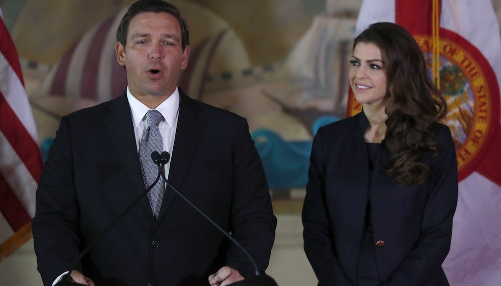 Florida Gov. Ron DeSantis, left, speaks with his wife Casey, at his side Jan. 9, 2019, in Miami. (AP)