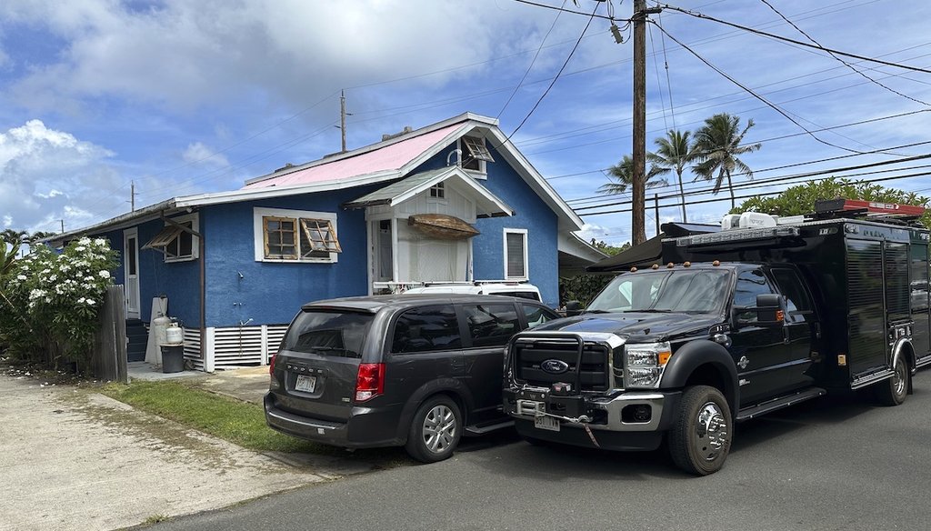 Investigator vehicles are parked outside the Kaaawa, Hawaii home of Ryan Routh, the man accused of an apparent attempt to assassinate Donald Trump, on Sept. 17, 2024, while FBI agents conduct a search inside. (AP)