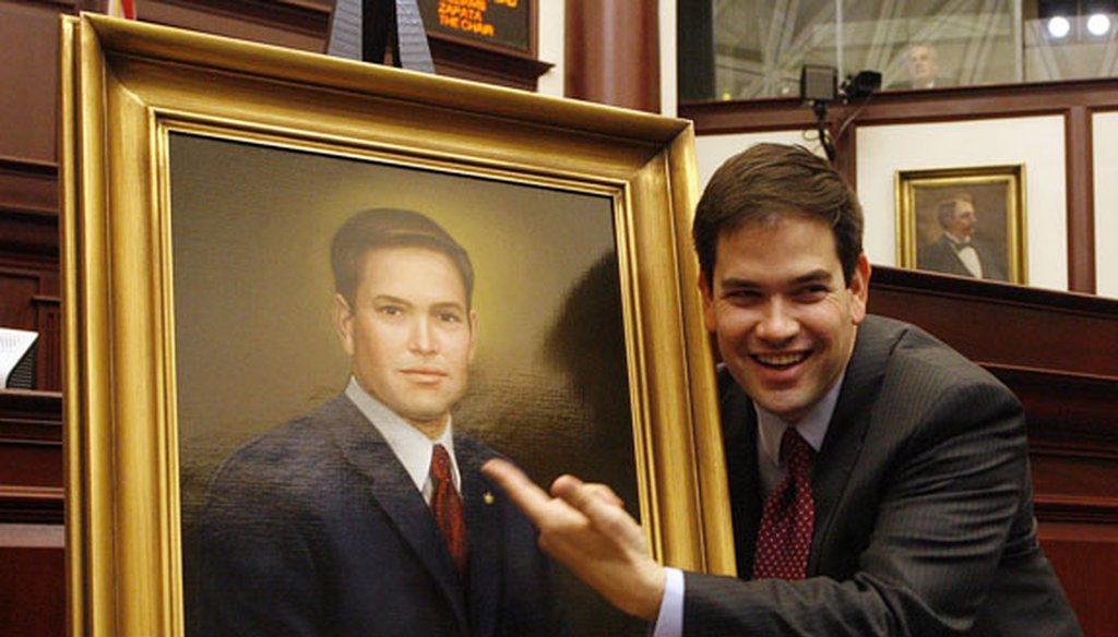 Marco Rubio with his official portrait in the Florida House near the end of his tenure as speaker in May 2008. (Tampa Bay Times file photo)
