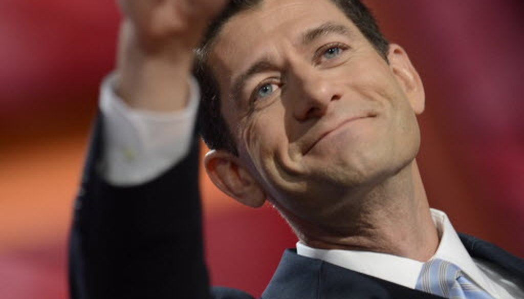 Paul Ryan gestures to GOP delegates after his address as the party's vice presidential nominee