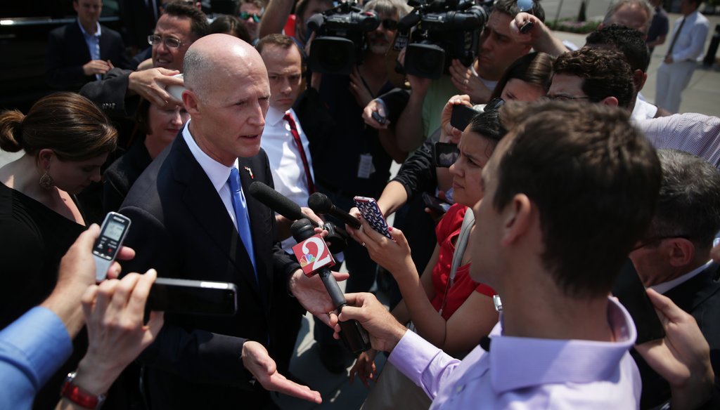 Gov. Rick Scott speaks with reporters in Washington, D.C., after meeting with U.S. Health and Human Services Secretary Sylvia Burwell on May 6, 2015. (Getty Images)