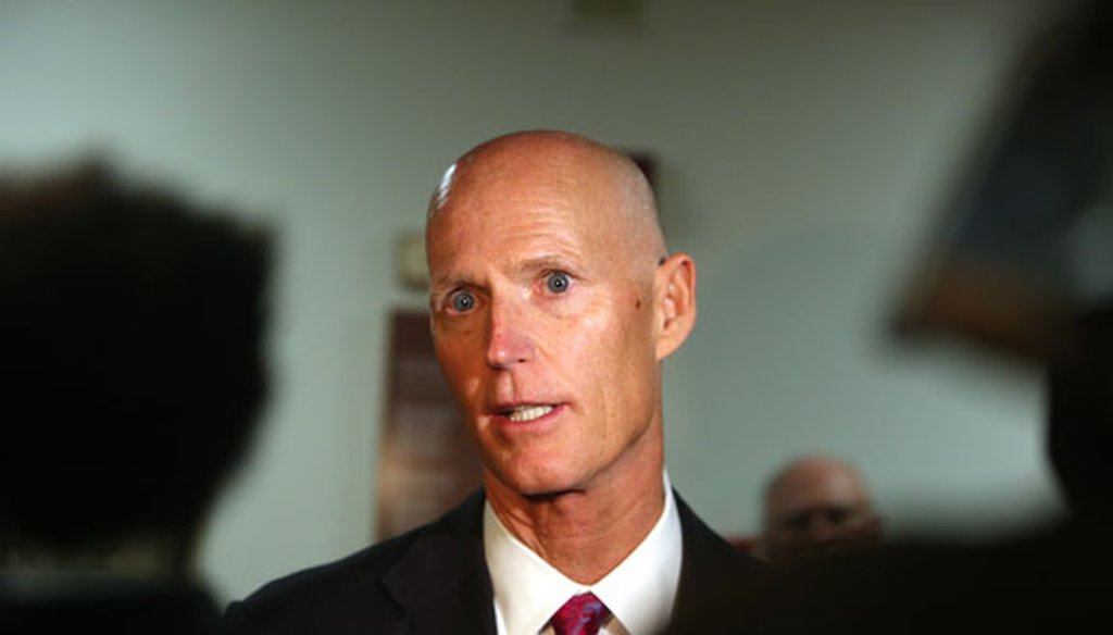 Florida Gov. Rick Scott answers questions after a meeting of the Florida Senate Finance and Tax Committee on Jan. 11, 2016. (Tampa Bay Times photo)