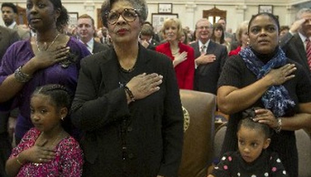 State Rep. Senfronia Thompson, D-Houston, takes her oath surrounded by family members at the start of the 2013 legislative session Jan. 8, 2013 (Austin American-Statesman, Rodolfo Gonzalez).