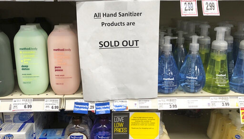 A sign on a shelf at a QFC grocery store in Kirkland, Wash., advises shoppers on March 3, 2020, that all hand sanitizer products are sold out. (AP)