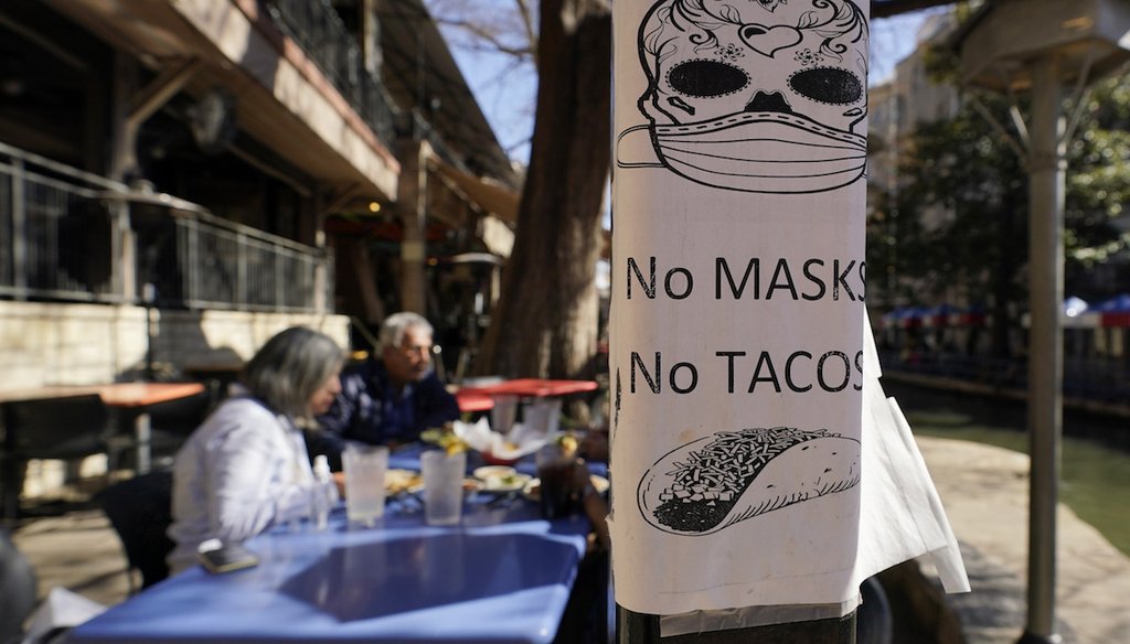 A sign outside a restaurant on the River Walk in San Antonio.  (AP Photo/Eric Gay)