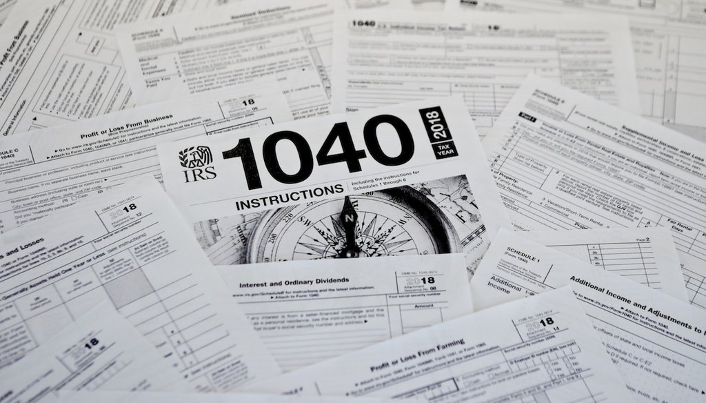 This 2019 photo shows multiple forms printed from the Internal Revenue Service web page that are used for 2018 U.S. federal tax returns. (AP)