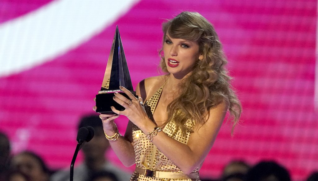 Taylor Swift accepts the award for favorite music video for "All Too Well (Taylor's Version)" at the American Music Awards on Nov. 20, 2022, in Los Angeles. (AP)
