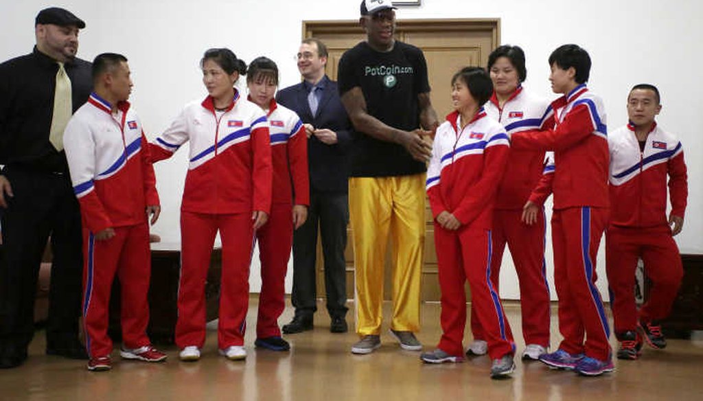 Former NBA basketball star Dennis Rodman, center, poses with North Korean Olympic athletes June 15, 2017, in Pyongyang, North Korea. (AP/Kim Kwang Hyon)