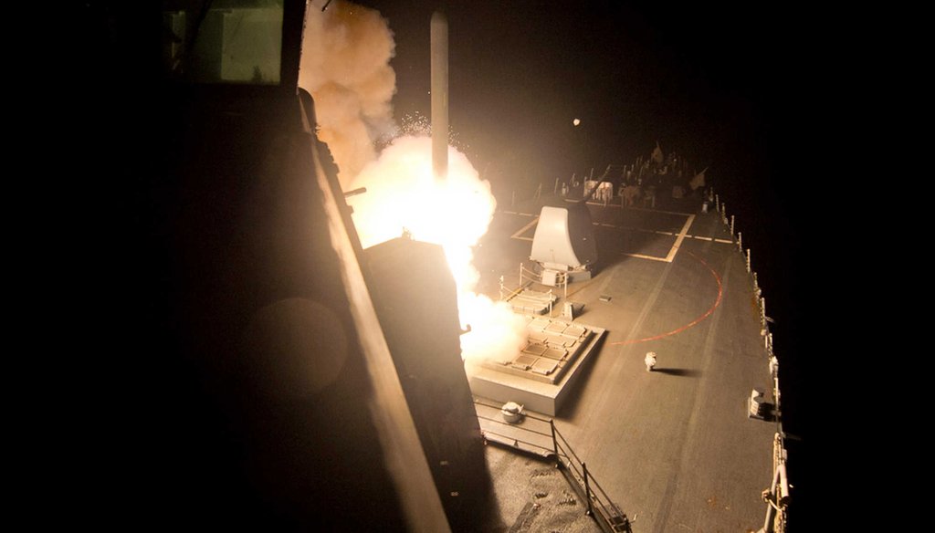 The guided-missile destroyer USS Arleigh Burke (DDG 51) launches Tomahawk cruise missiles on Tuesday, Sept. 23 ,2014, from the Red Sea against Islamic State group targets in Syria. (AP/U.S. Navy)