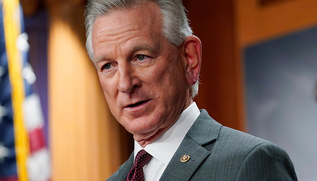 Sen. Tommy Tuberville, R-Ala., left, listens to reporters’ question during a news conference March 30, 2022, in Washington. (AP)