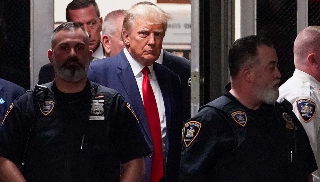 Former President Donald Trump is escorted to a courtroom April 4, 2023, in New York. (AP)