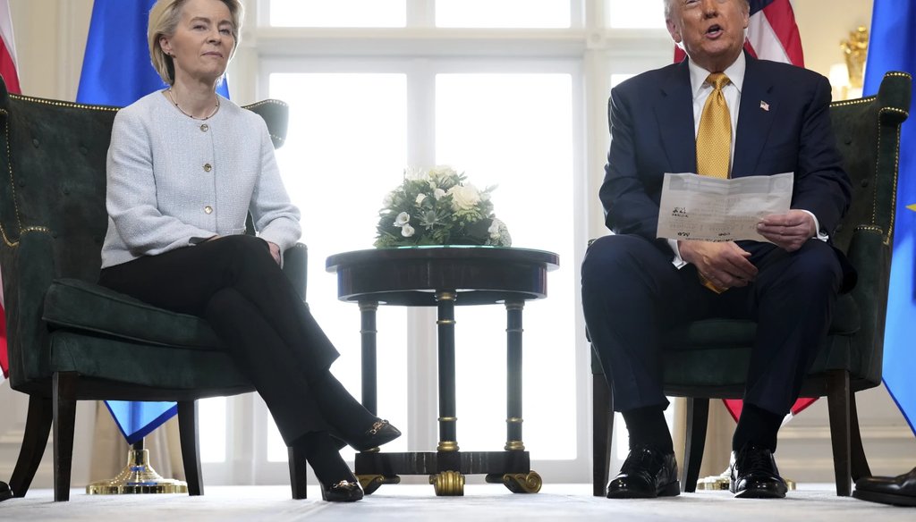 President Donald Trump reads from a paper and European Commission President Ursula von der Leyen listens after reaching a trade deal between the U.S. and the EU at the Trump Turnberry golf course in Turnberry, Scotland Sunday, July 27, 2025. (AP)