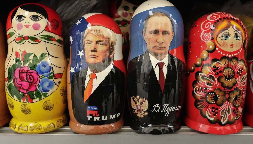 In this Feb. 20, 2017 traditional Russian wooden dolls depicting U.S. President Donald Trump and Russian President Vladimir Putin are displayed for sale at a souvenir shop in St.Petersburg, Russia. (AP Photo/Dmitri Lovetsky) 