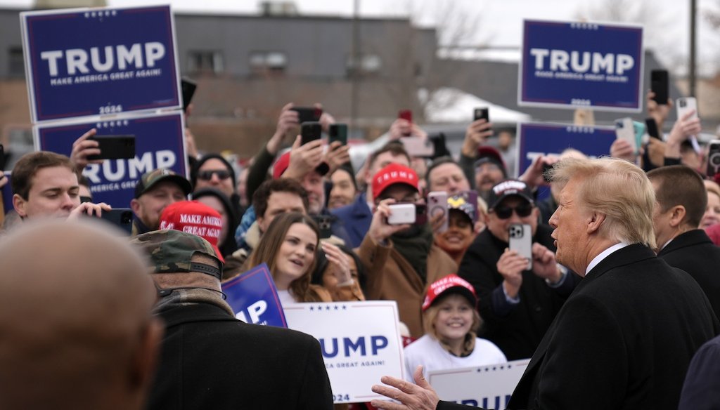 2024 Republican presidential candidate and former President Donald Trump, right, greets supporters Jan. 23, 2024, at a campaign stop in Londonderry, N.H. (AP)