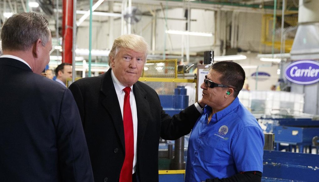 President-elect Donald Trump talks with workers during a visit to the Carrier factory, Thursday, Dec. 1, 2016, in Indianapolis, Ind. (AP)