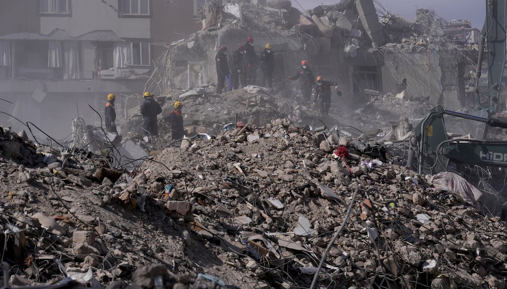 Rescuers dig for survivors in Kahramanmaras city, southern Turkey, Feb. 15, 2023. (AP Photo/Hussein Malla)
