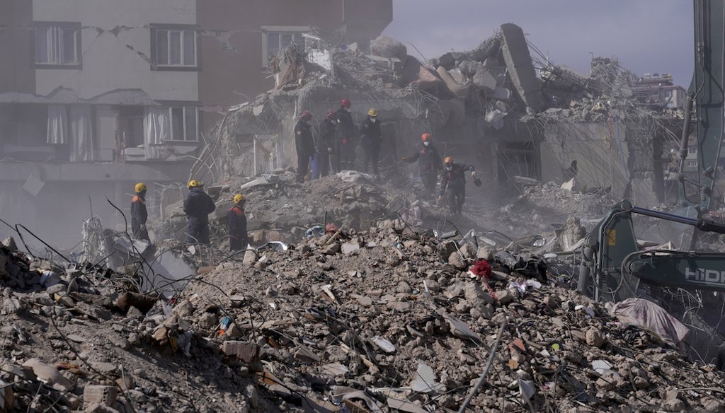 Rescuers dig for survivors in Kahramanmaras city, southern Turkey, Feb. 15, 2023. (AP Photo/Hussein Malla)