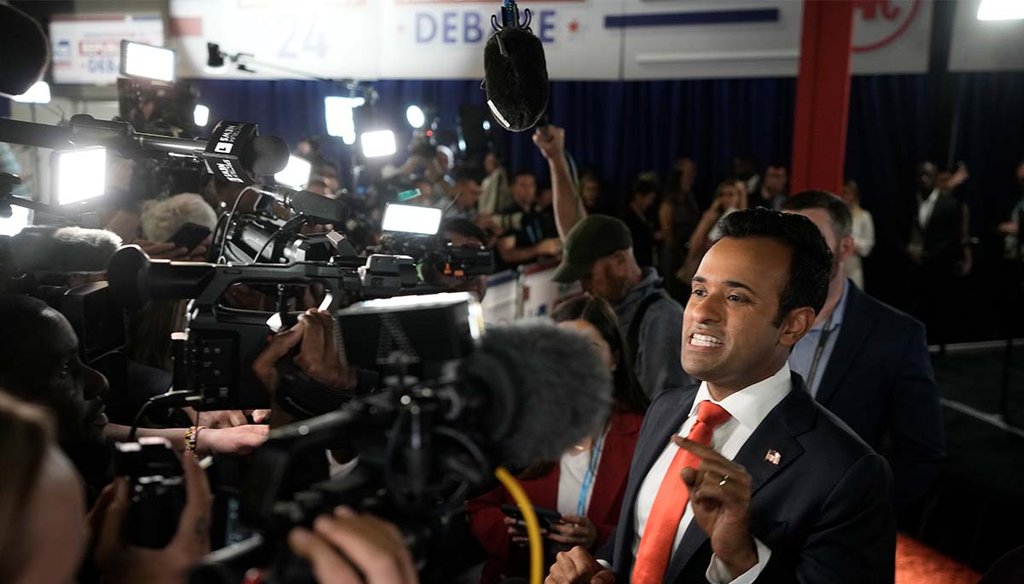 Entrepreneur Vivek Ramaswamy talks with reporters in the spin room after a Republican presidential primary debate Aug. 23, 2023, at the Fiserv Forum in Milwaukee. (AP)