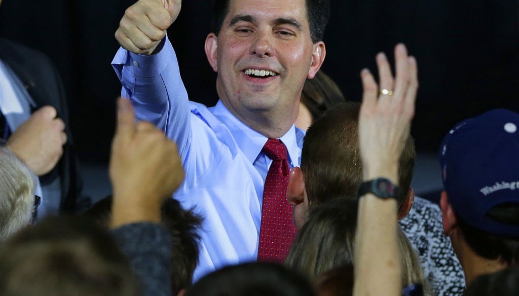 Governor Scott Walker thanks supporters as he wins another term over challenger Mary Burke during his election night rally at the Wisconsin State Fair Park Exposition Center in West Allis, November 4, 2014. Milwaukee Journal Sentinel photo by Rick Wood