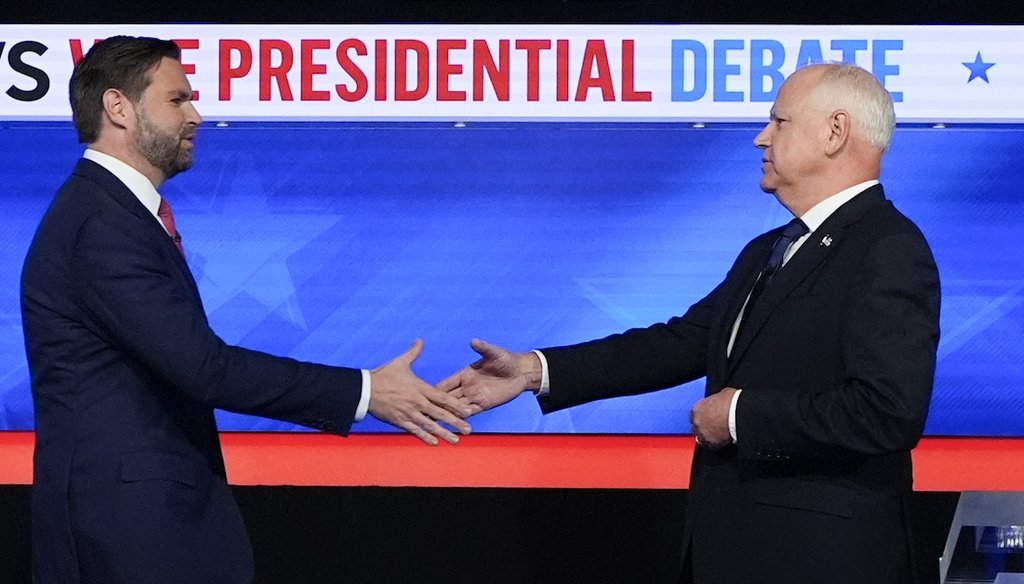 Republican vice presidential nominee Sen. JD Vance, R-Ohio, left, and Democratic vice presidential nominee Minnesota Gov. Tim Walz shake hands as they arrive Oct. 1, 2024, for a CBS News vice presidential debate in New York. (AP)