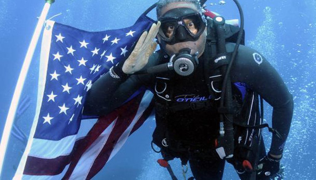 Allen West went scuba diving with a group of veterans, and the American flag, on June 12, 2011.