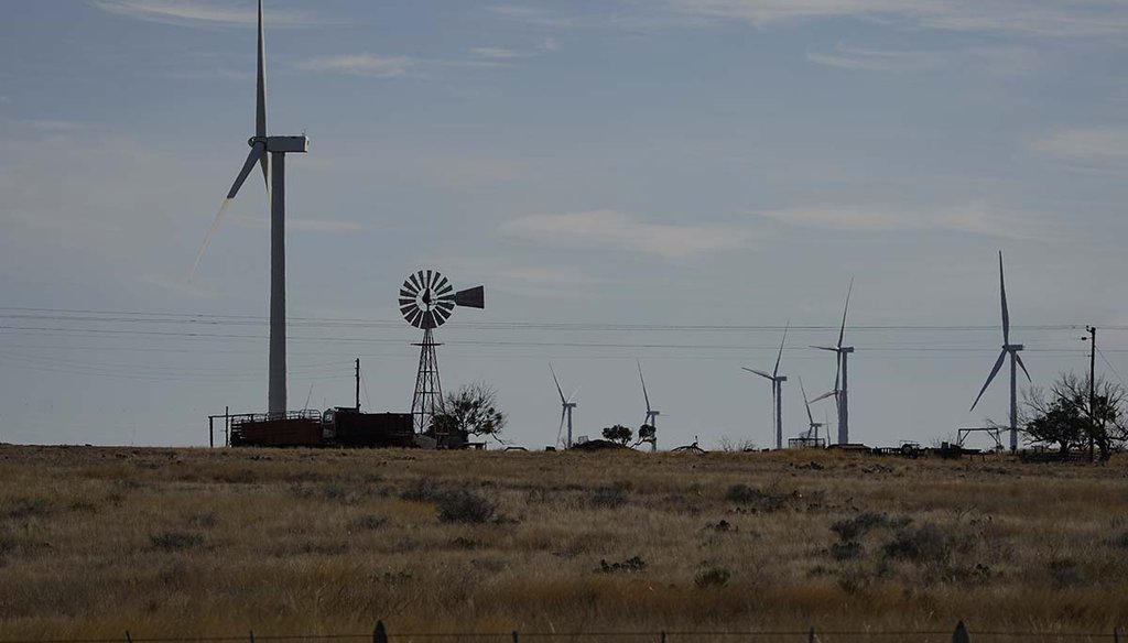 Wind turbines tower over a traditional windmill Feb. 17, 2023, on a ranch near Del Rio, Texas. (AP)