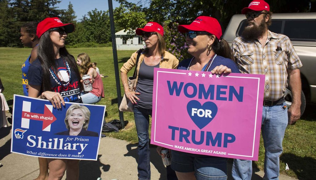 Supporters hold signs hours before a Donald Trump rally in Lynden, Wash., May 7, 2016. (David Ryder/The New York Times)