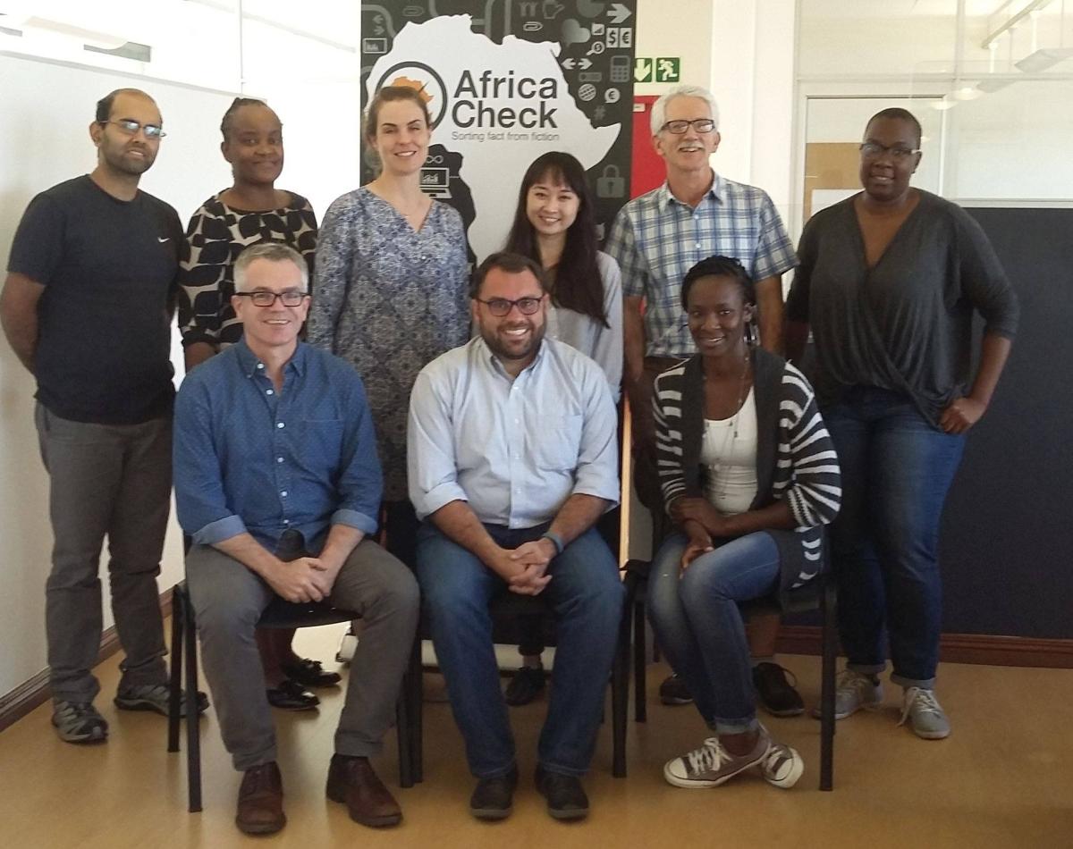 Some of the staff of Africa Check and PolitiFact in a meeting in Johannesburg, South Africa.