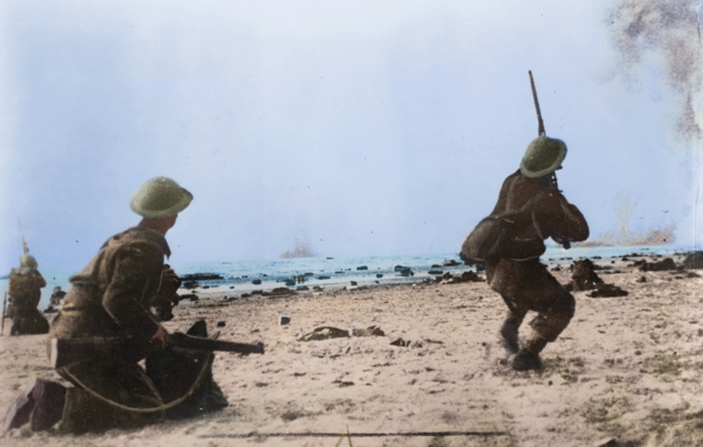British troops fire their rifles at German planes on a bombing run over the beach at Dunkirk. (Cassowary Colorizations, via Flickr Creative Commons)