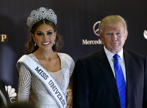 Miss Universe 2013 Gabriela Isler of Venezuela and Donald Trump pose for a photo after the 2013 Miss Universe pageant in Moscow on Nov. 10, 2013. (AP/Ivan Sekretarev)