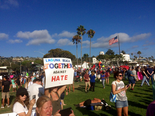 A larger counter-protest in Laguna Beach, Calif., faces off against a smaller group demonstrating against illegal immigration on Aug. 20, 2017. (AP/Christopher Weber)