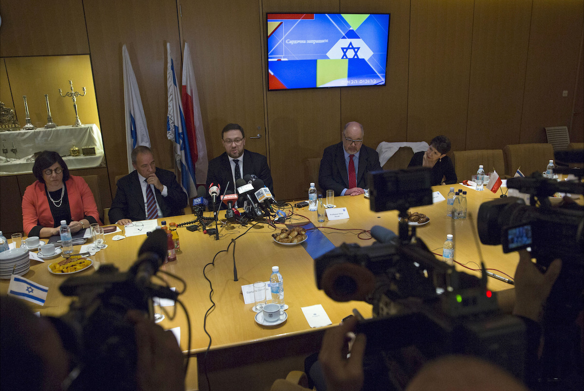 Deputy Foreign Minister of Poland Bartosz Cichocki meets with Director General of the Israeli Foreign Ministry Yuval Rotem to discuss the new Polish 'Holocaust law' at the Foreign Ministry in Jerusalem on March 1, 2018.