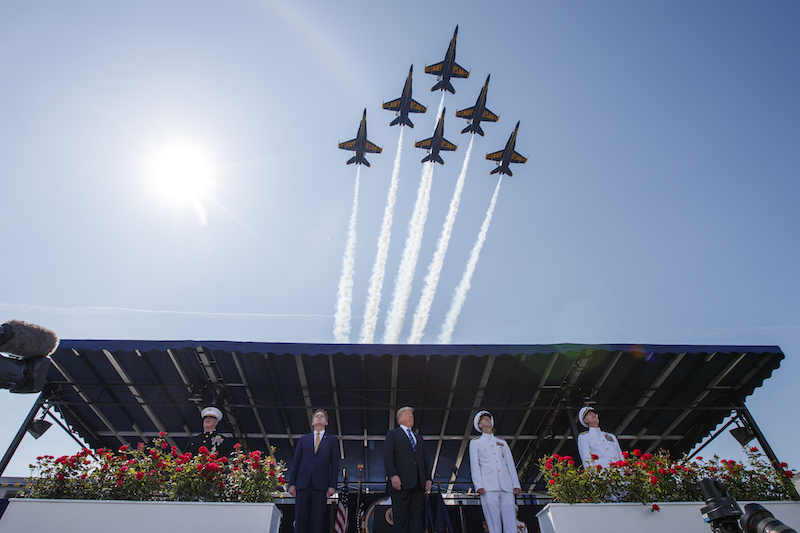 President Donald Trump looks on as the Blue Angels fly over the graduation ceremony at the U.S. Naval Academy on May 25, 2018, in Annapolis, Md. (AP)