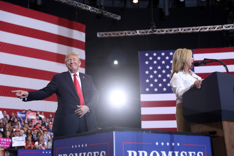 President Donald Trump gestures as Rep. Marsha Blackburn, R-Tenn., speaks at a rally at the Nashville Municipal Auditorium on May 29, 2018, in Nashville, Tenn. (AP)