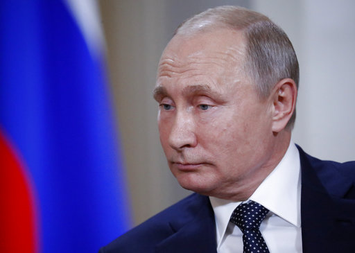 Russian President Vladimir Putin listens to U.S. President Donald Trump at the beginning of a one-on-one-meeting at the Presidential Palace in Helsinki, Finland, on July 16, 2018. (AP/Pablo Martinez Monsivais)
