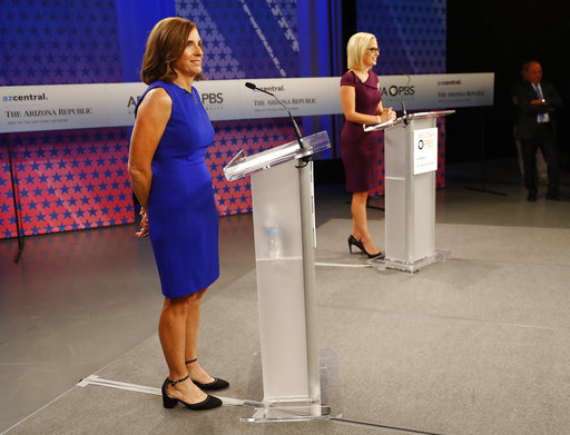 U.S. Senate candidates, U.S. Rep. Martha McSally, R-Ariz., left, and U.S. Rep. Kyrsten Sinema, D-Ariz., debated Oct. 15, 2018, in Phoenix. (AP Photo)